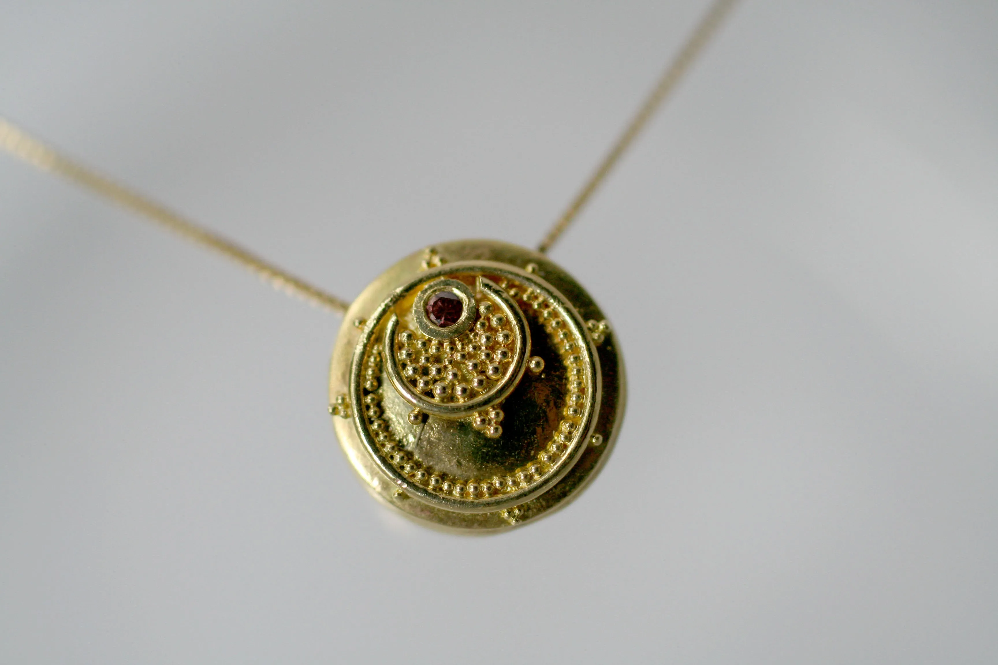 18kt Eclipse Token Pendants
