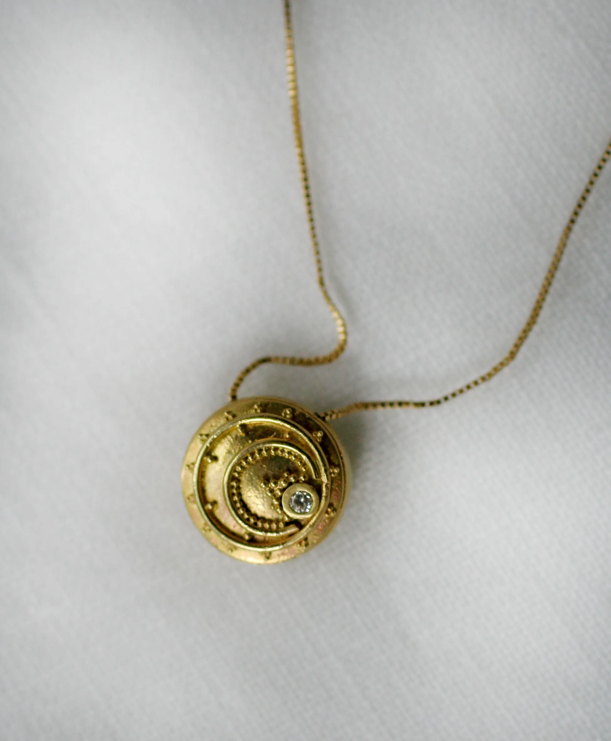 18kt Eclipse Token Pendants