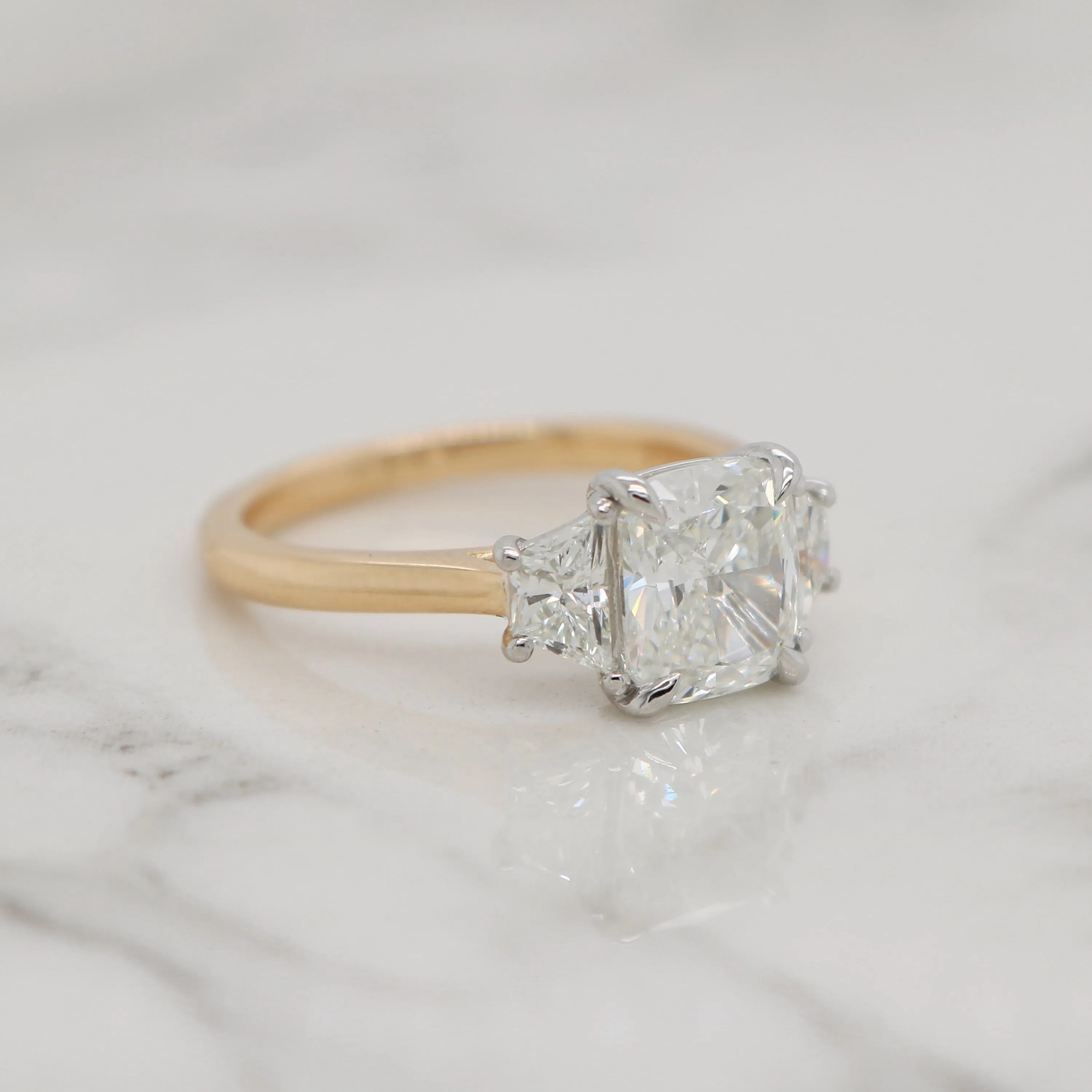 3 Stone Cushion with Trapezoid Diamonds