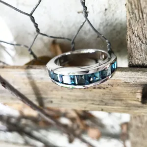 Contemporary Half Eternity Ring Featuring Seven Square Cut London Blue Topaz
