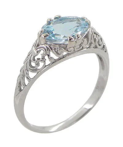 Edwardian Oval Sky Blue Topaz Filigree Engagement Ring in 14 Karat White Gold