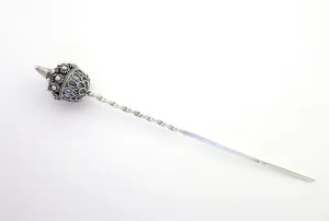 Finely detailed, exquisite, Miao-inspired bun stick