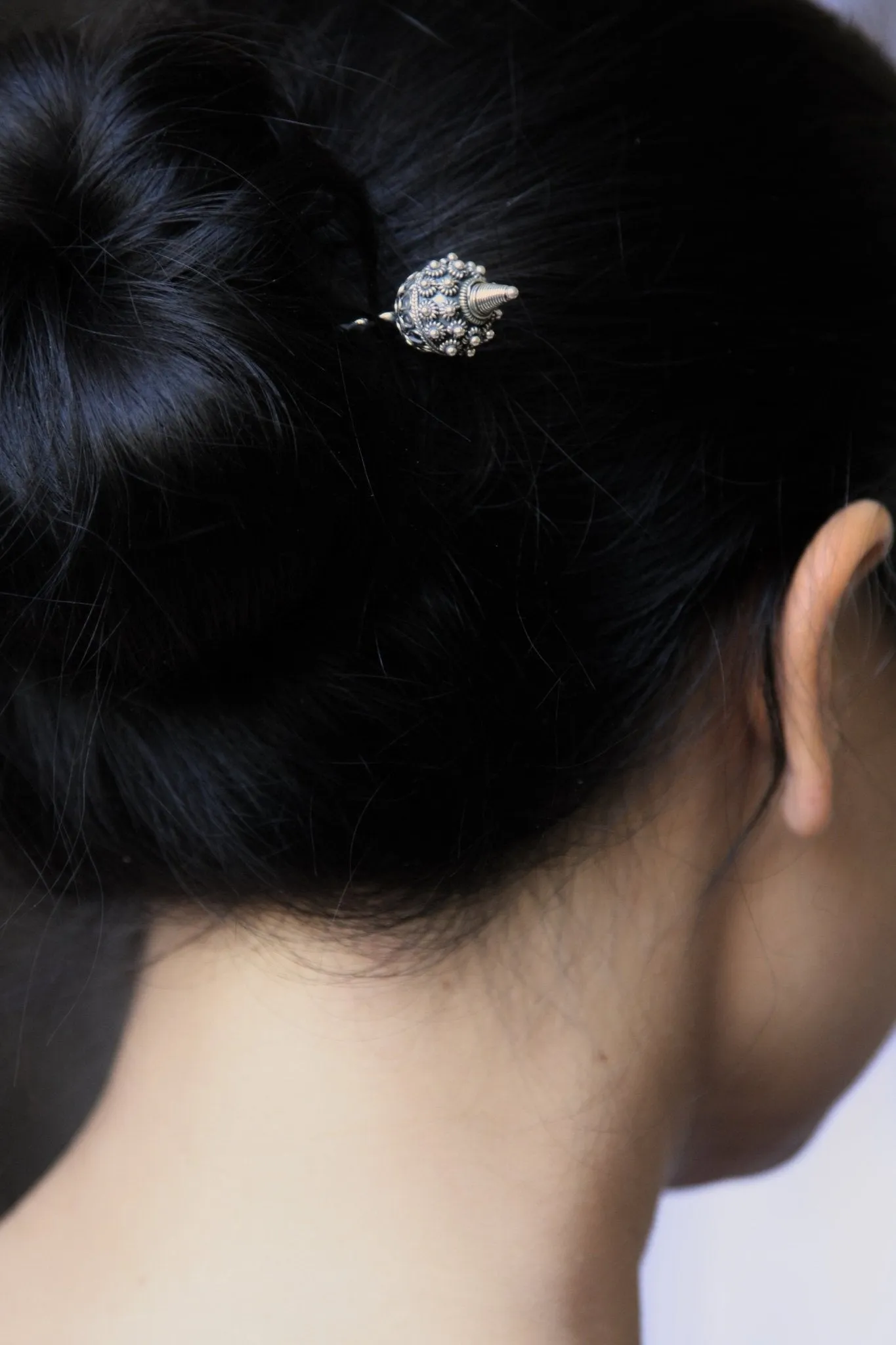 Finely detailed, exquisite, Miao-inspired bun stick
