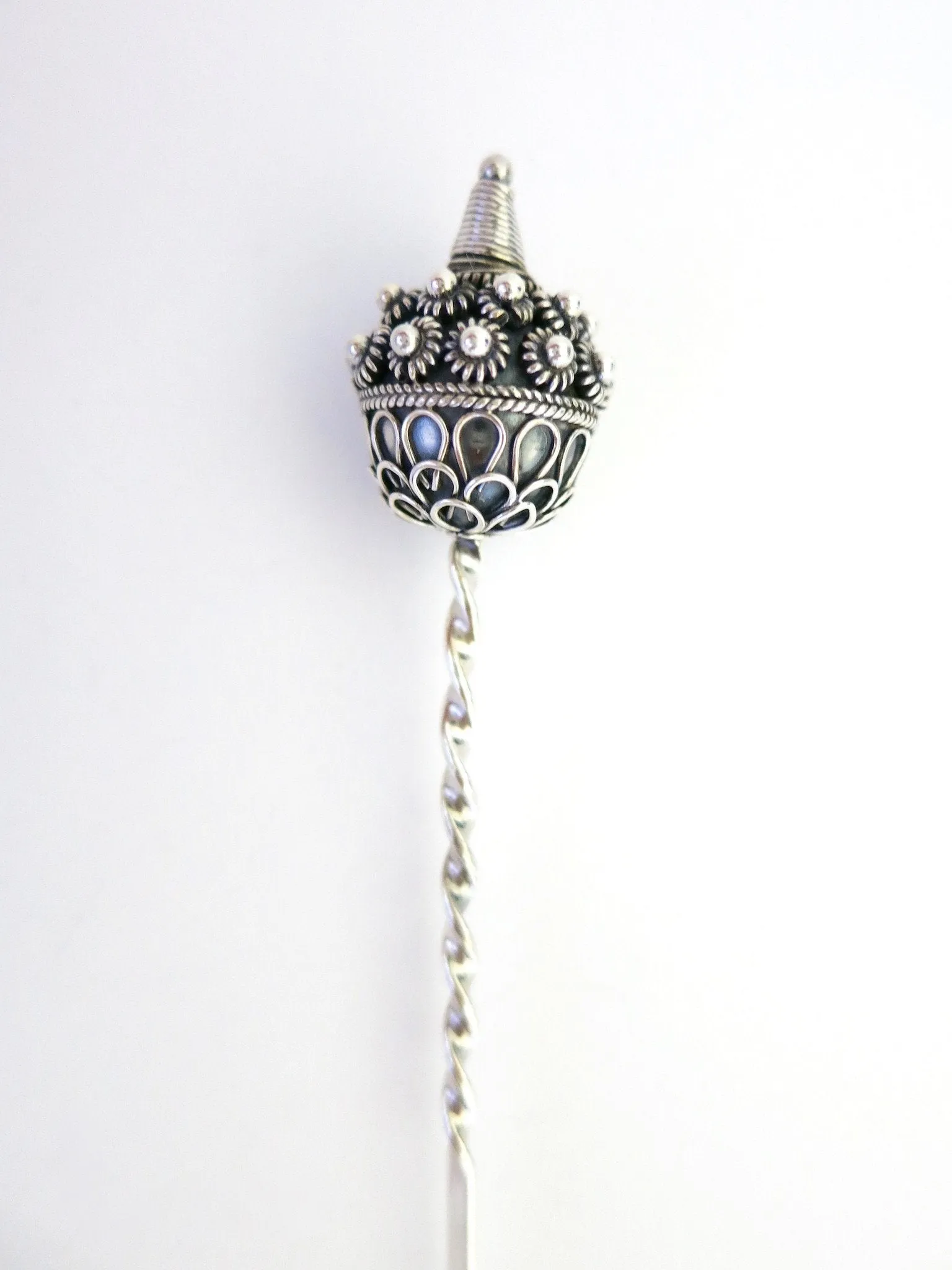 Finely detailed, exquisite, Miao-inspired bun stick