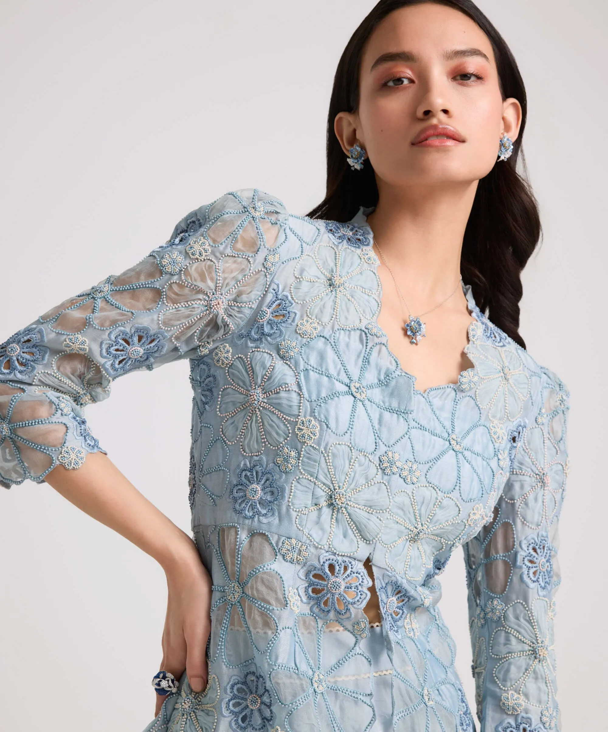 Powder blue sheer applique peplum jacket