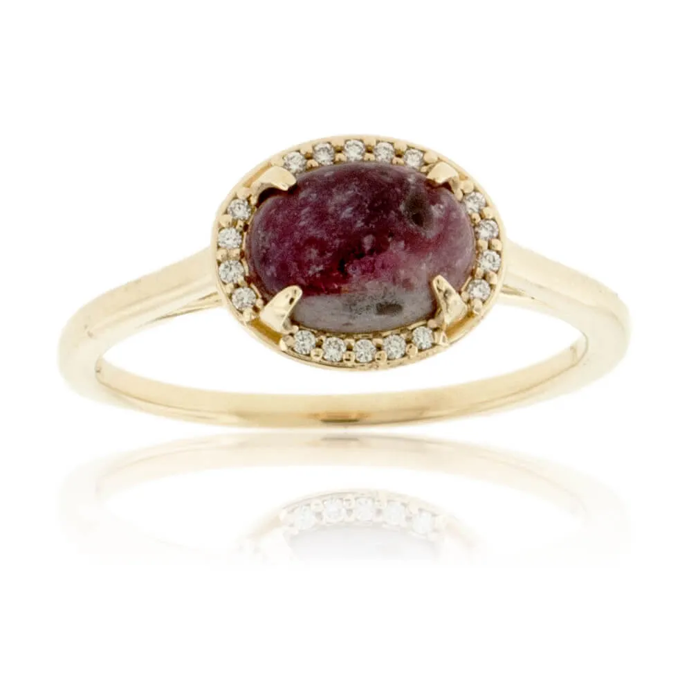 Red Emerald Cabochon with Diamond Halo Ring
