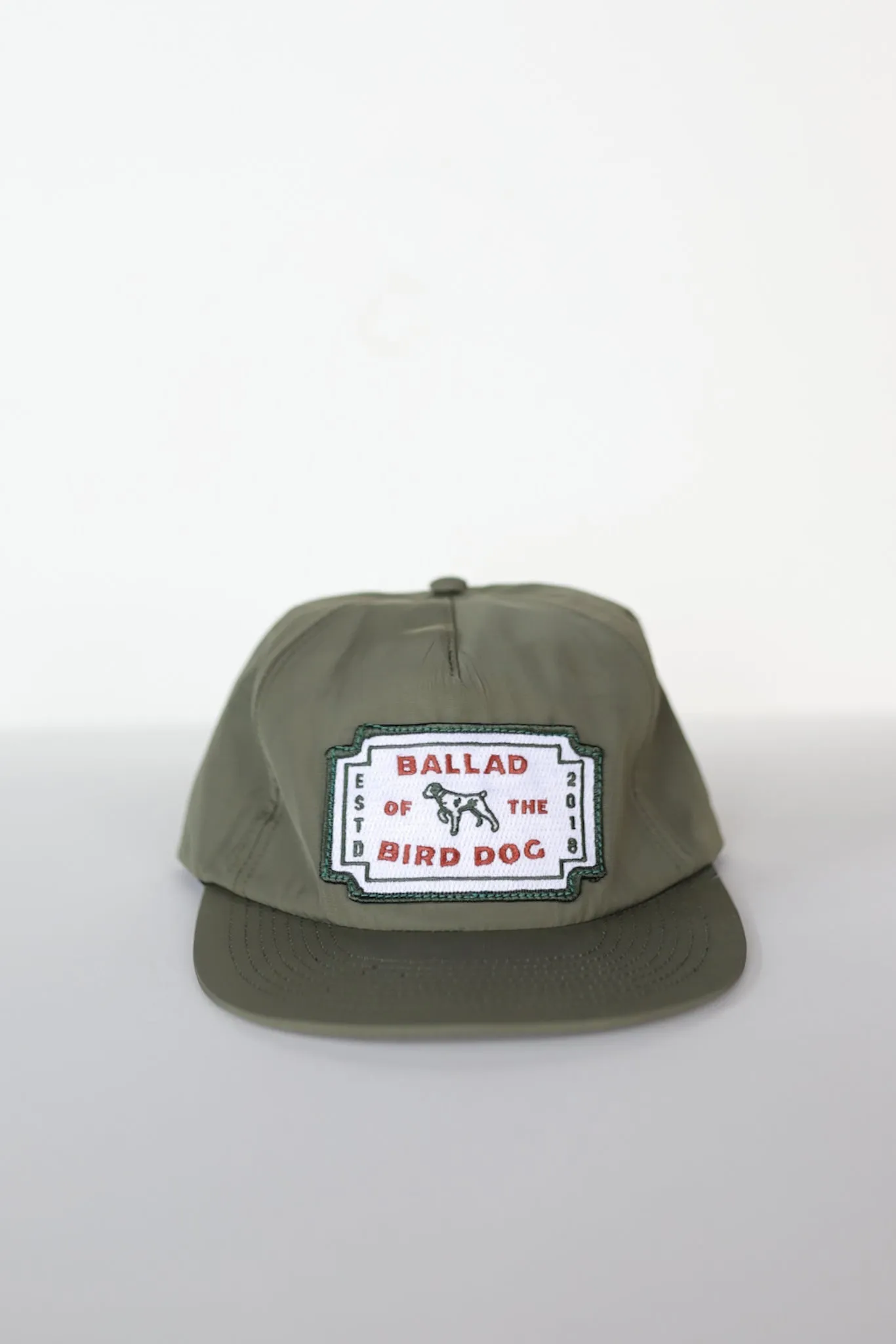 Shop Hat | Neon Revival | Ballad of the Bird Dog