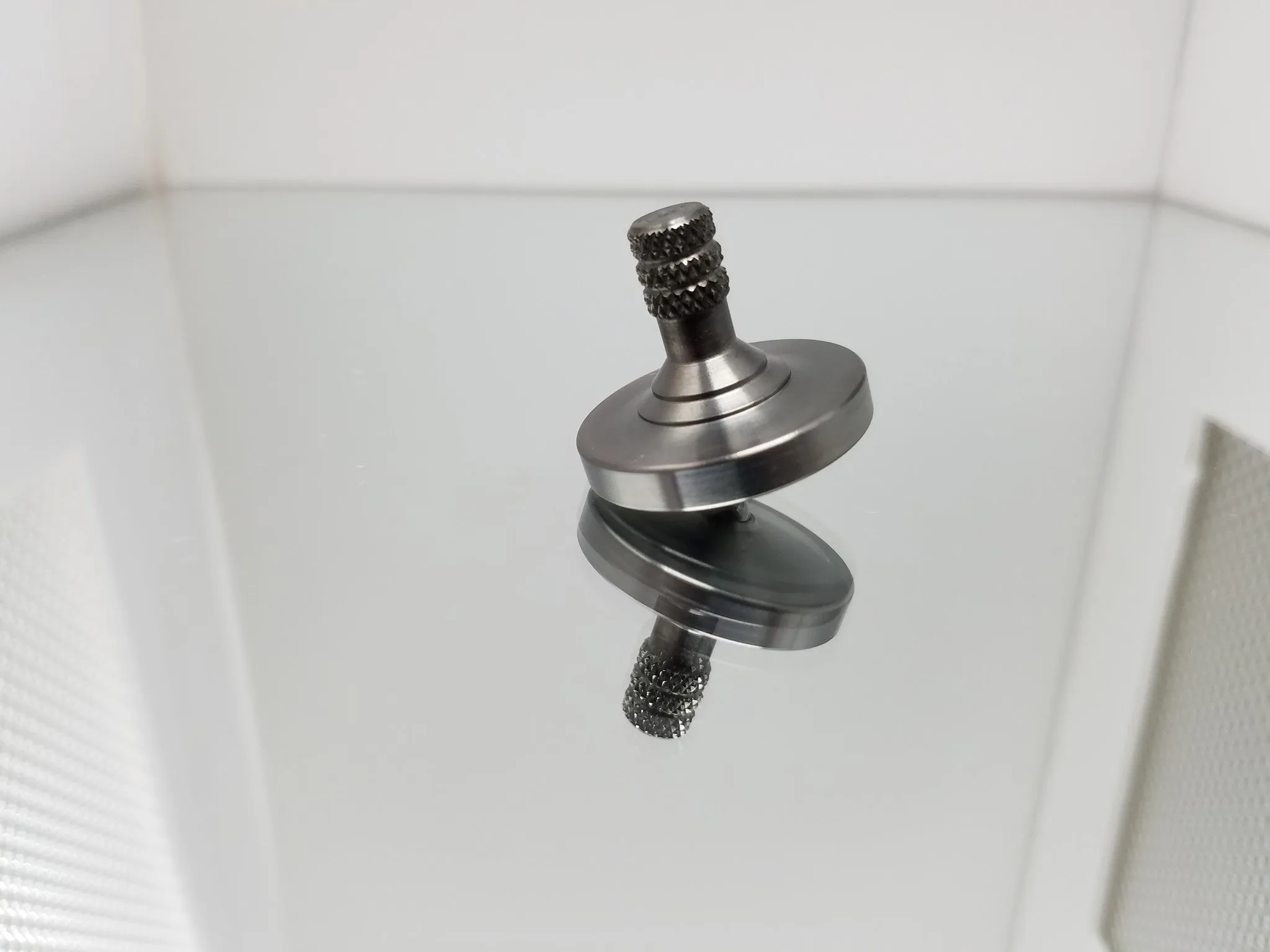 Stainless Steel Spinning Top with Gun Metal Finish