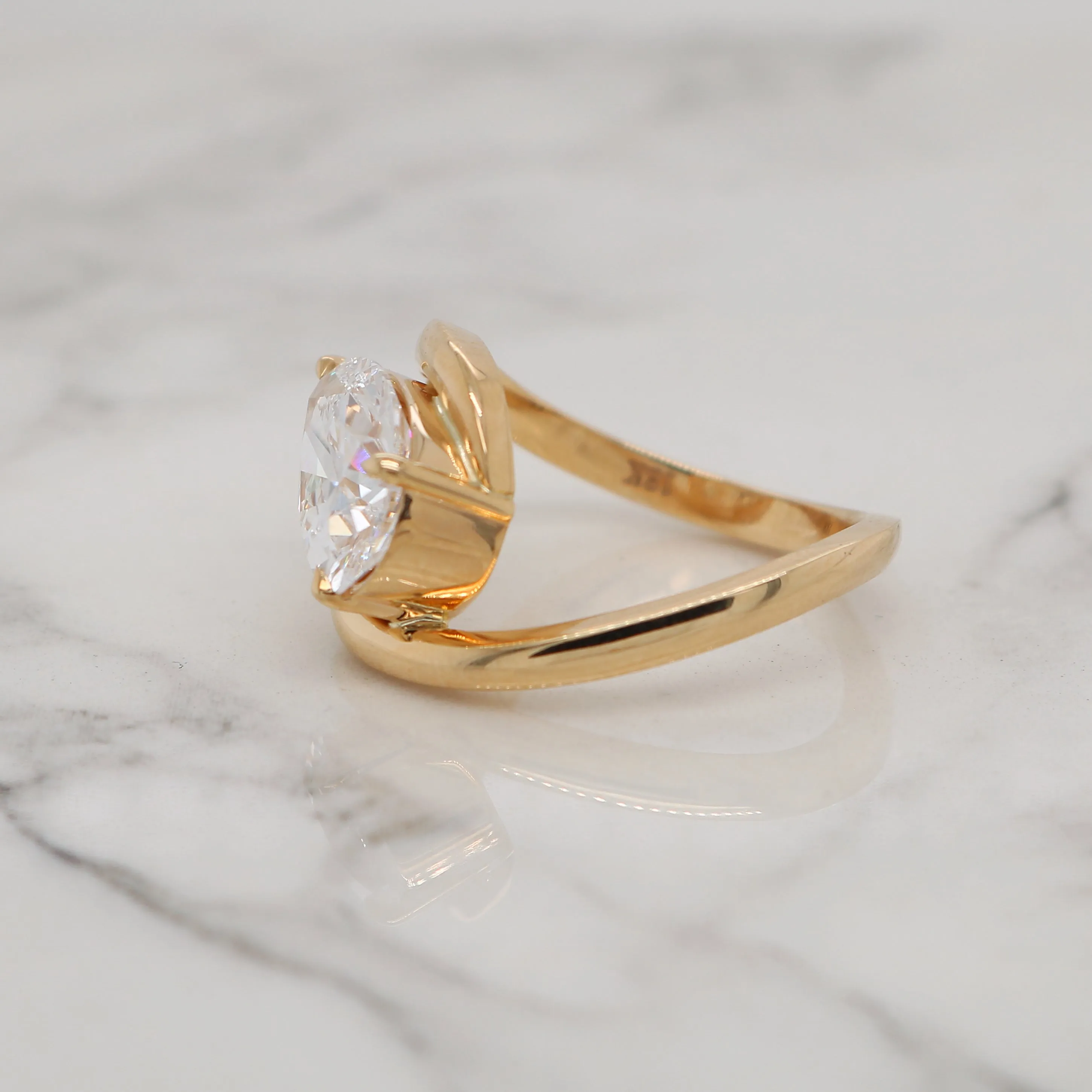 Twisting East West Pear Shape Ring