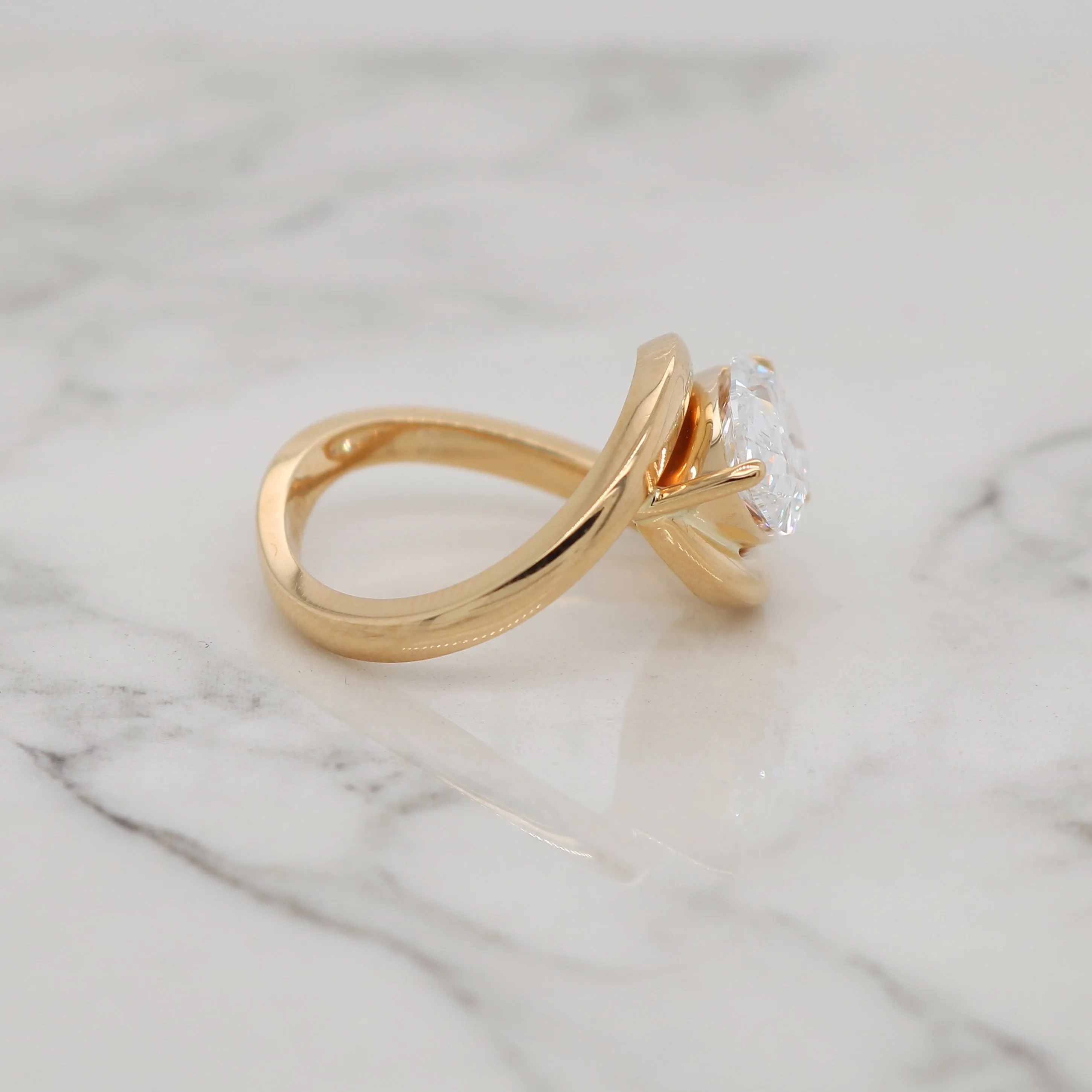 Twisting East West Pear Shape Ring